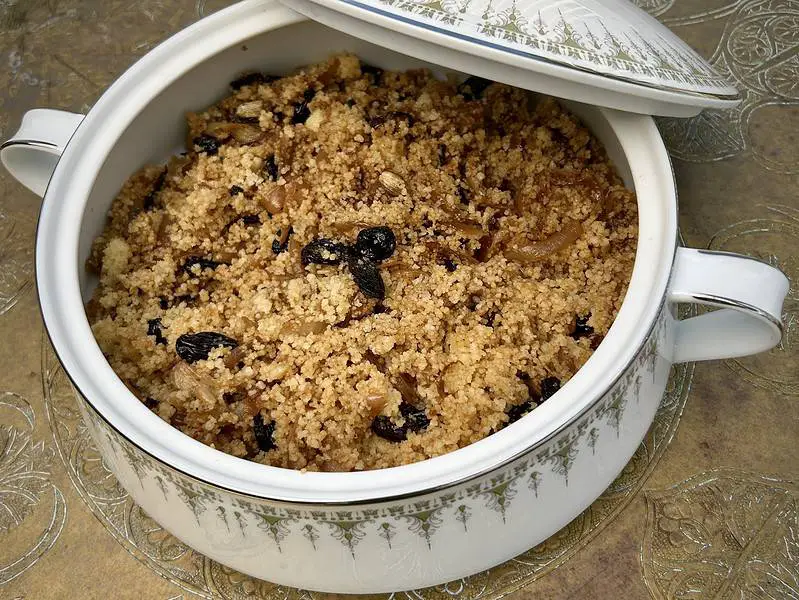 Delicious bowl of couscous with caramelized onions and raisins, a Maghrebi delight